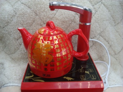 Authentic Jia Xuan handicraft gift ceramic electric  automatic water boil water pumping home tea set