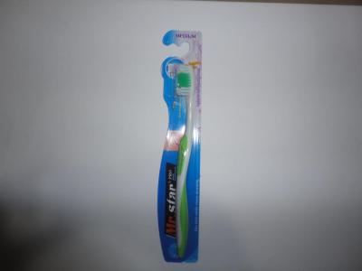 Brush handle with anti-slip brush with a tongue scraper adult toothbrush