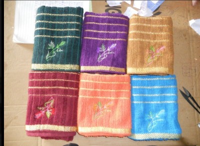 Solid bar stock embroidered bath towels