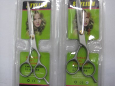 Scissors for haircuts, brushes