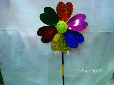 Individual sequins windmills of smiling faces make craft gift factory