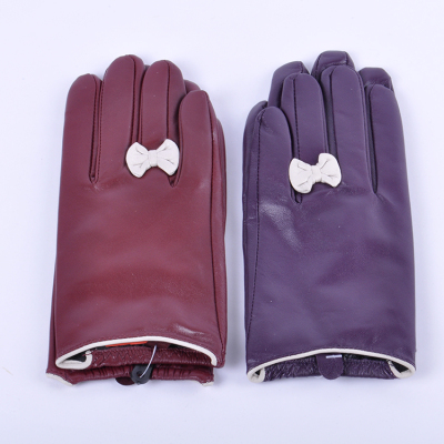 Bai Hu Wang Sheepskin gloves. Warm ladies leather bow gloves ring Sheepskin gloves