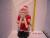 Dressed in bright clothes Santa Christmas decoration