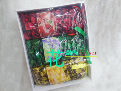 The large box contains six packages of dried flower housepots
