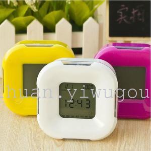 Rotate four clock electronic alarm clock cute mute lazy luminous temperature color changing clock-calendar