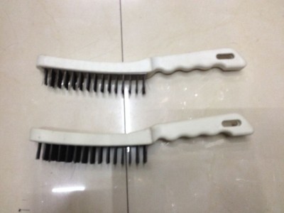 Wire brush with yellow handle, bent handle, Wire brush with plastic handle, Wire brush with steel Wire brush