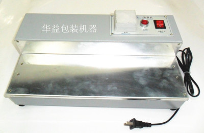 Metal shell manual ironing film machine cosmetics tobacco film tea manual three-dimensional transparent film machine