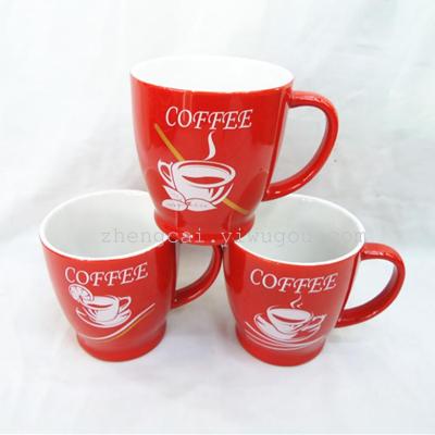 Ceramic coffee cup  red ceramic glazed mug stock 