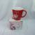Ceramic coffee cup  red ceramic glazed mug stock 