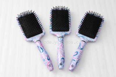 Pink and purple prints a hair comb comb comb comb comb ribs care