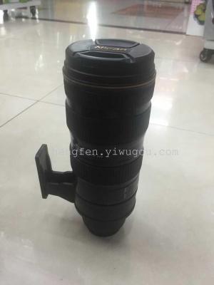 Nikon holding a cup of Nikon insulation lens cup with a handle 173