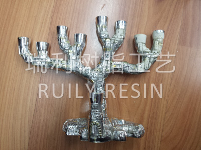 Resin-religious crafts are plated with nine candlesticks.
