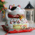 Nine inches of multicolor fortune fortune cat firing piggy bank sw365c