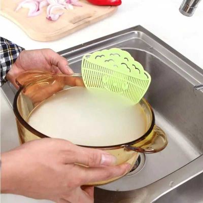 Creative kitchen cute smile clamping type rice washing filter multifunctional plastic guard meter drainer
