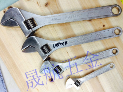  adjustable wrench, nickel plated, multi - function, adjustable, adjustable, adjustable, and metal tool.