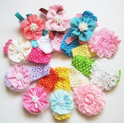 A variety of CHIFFON FLOWER HAIR BAND children with children with wholesale knitted ribbons