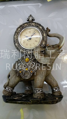 Resin crafts and animals painted elephant clocks.