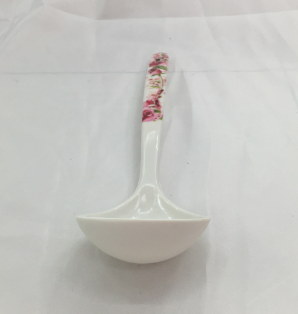 Miamine tableware is a large spoon with a porcelain handle