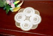 Round gold and silver dinner mat
