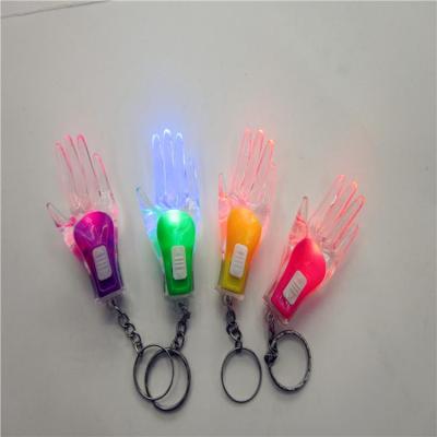 Small gift LED hand lamp factory direct sales luminous key button small hand
