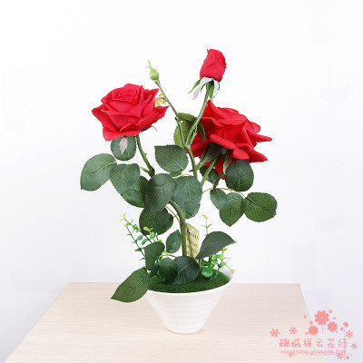 The red rose flower pot flowers table decoration decoration decoration room