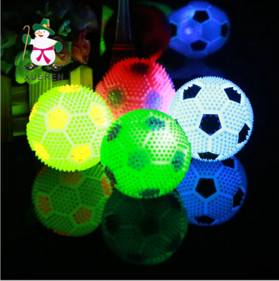Luminous toy colorful flash 7.5cm massage ball whistle flash football toy factory direct sales