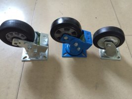 Flat car wheel with brake pad