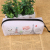 Printing tower PU bag cross striate cortex student bag ladies cosmetic bag pencil