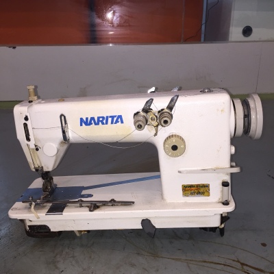 Double needle double chain sewing machine