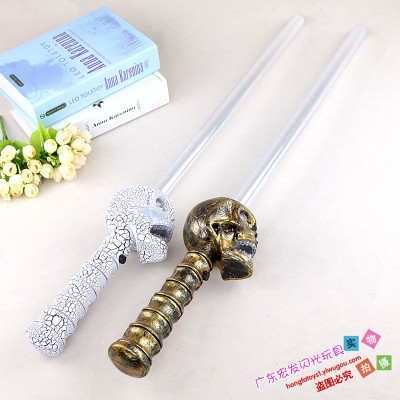 Children's toys skeleton head flash music sound and light toys light sword