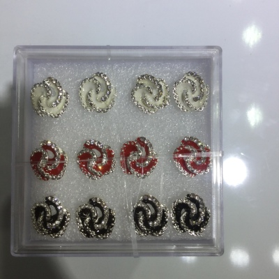 Alloy rose rice bead black and white drop oil ear stud