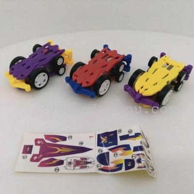 Double sided inertia vehicle with sticker