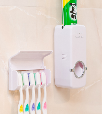 Automatic toothpaste squeezing device with 5 toothbrush holder