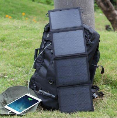 Solar energy charger outdoor folding mobile phone charger smart charging pad.