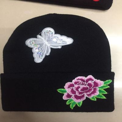 The Embroidered rose hat with large cap.