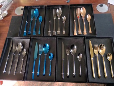 Stainless steel, gold plated, knife, fork and spoon