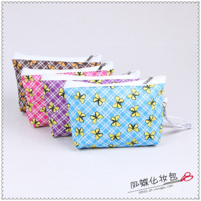 Yellow little butterfly makeup bag is a portable travel makeup pack