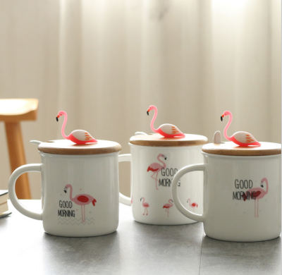flamingo mug with cover and spoon..