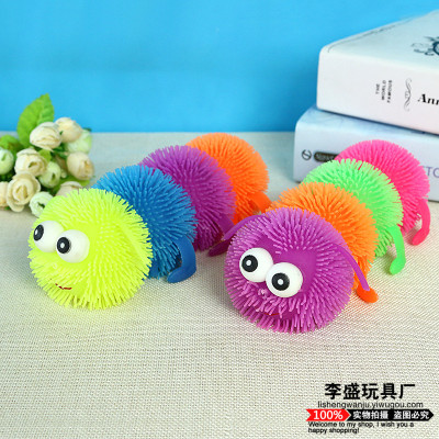 Four caterpillars vented a ball of glitter ball, a children's light toy, a toy and a toy.