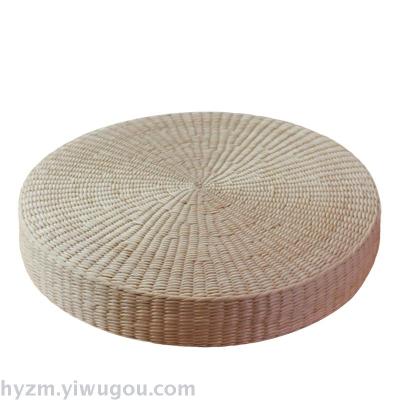 Futon round grass woven tatami mat and heavy floating window seat to sit on the Buddha mat yoga mat.