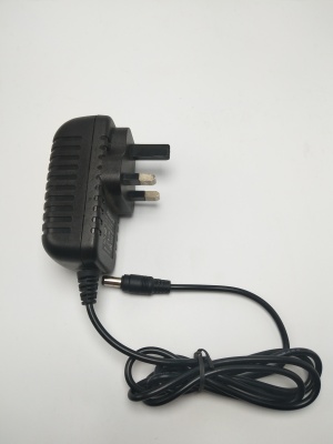 DC12V2A British plug switch power adapter.