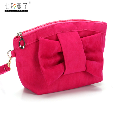 Korean version of the waterproof velvet makeup bag female butterfly hand bag