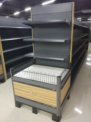 The spot promotion counter is on sale of the steel and wood floor of the supermarket.
