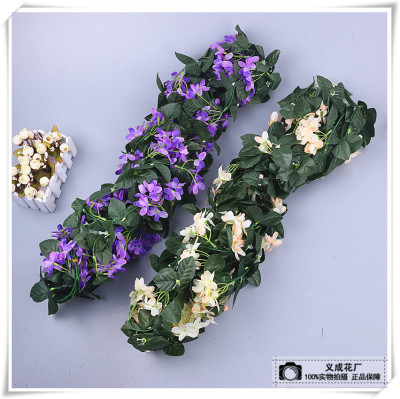 Simulation of flower rattan artificial cane plastic air conditioning duct decoration flower wall hanging vines.