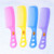 Color soft material three-hole comb cheap plastic comb 2 yuan shop floor.