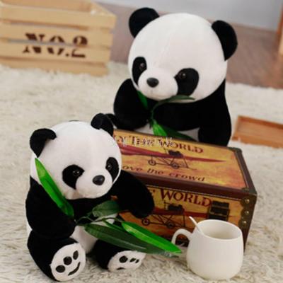 Sitting panda holding bamboo doll, plush toys