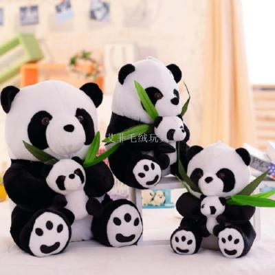 Mother and child hold bamboo panda doll, plush toys
