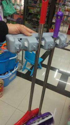 The mop holder holds four mop buckles