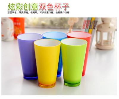 Show off the multi-function double candy-colored bathroom mug with a glass of creative plastic toothbrush cup