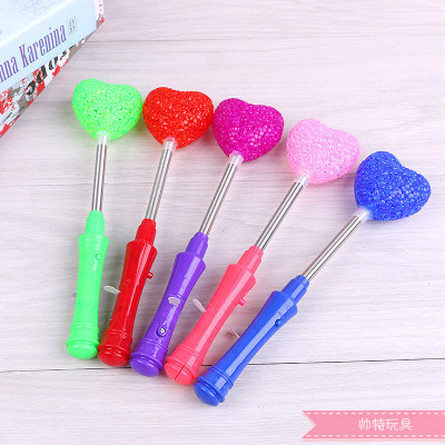 Heart - shaped rice flash fluorescent particle light stick is children 's luminous floor toys are sold